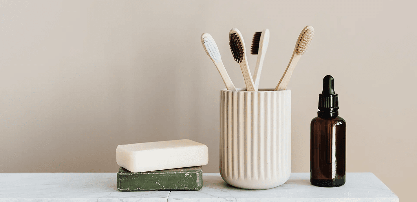 Dental care products including toothbrushes, soap, and dropper bottle